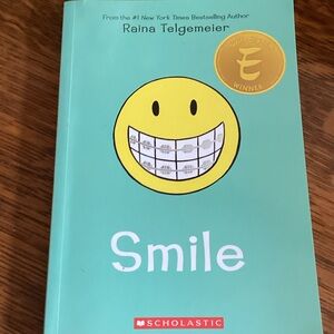 Scholastic Teal Cover with Yellow Smiley Face